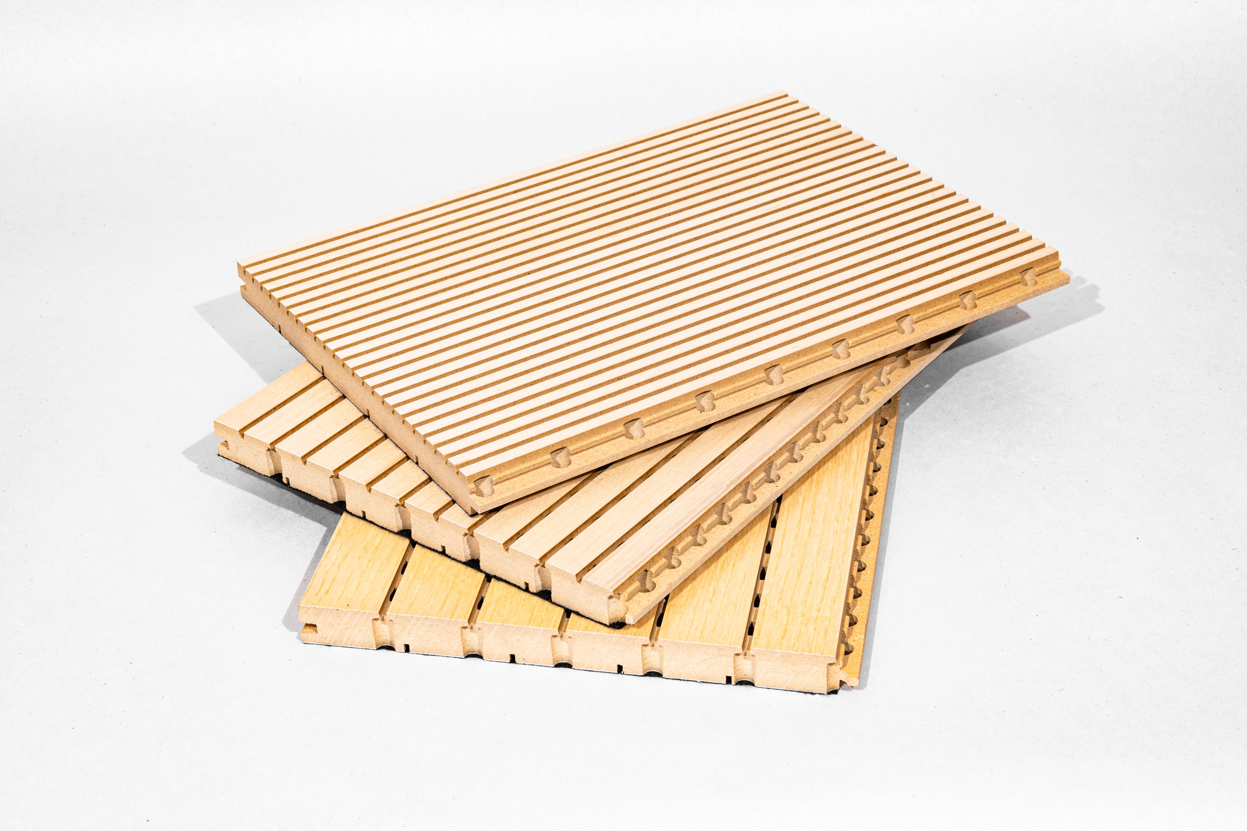 Example of an acoustical grooved panel and plank
